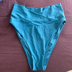 Earie crossover cheeky high rise bikini bottom